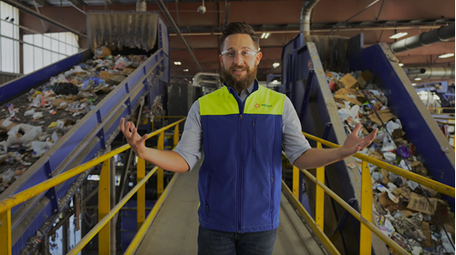 Man in recycling facility
