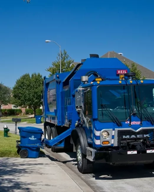 Republic Services truck picking up a bin